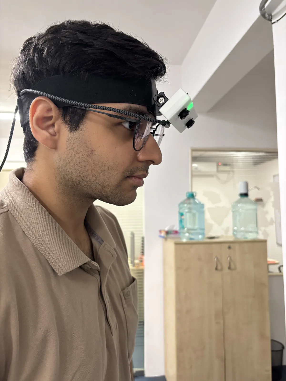 Trinet stereo camera on a head strap, side view